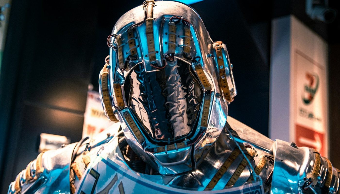 blue and black helmet on blue and white textile