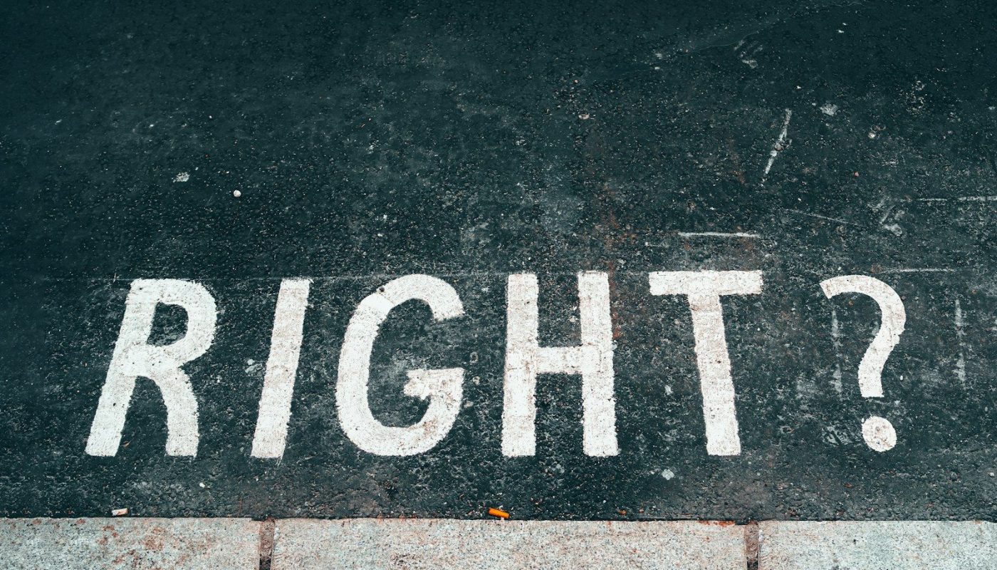 black and white stop road sign