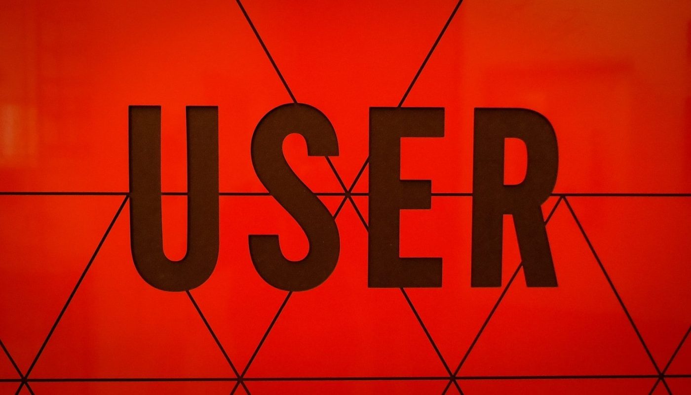 a close up of the word user on a wall