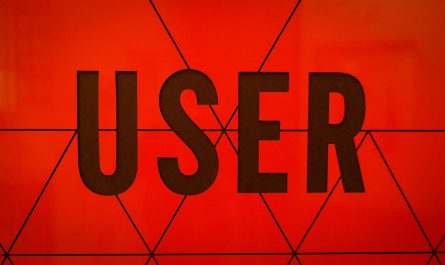 a close up of the word user on a wall
